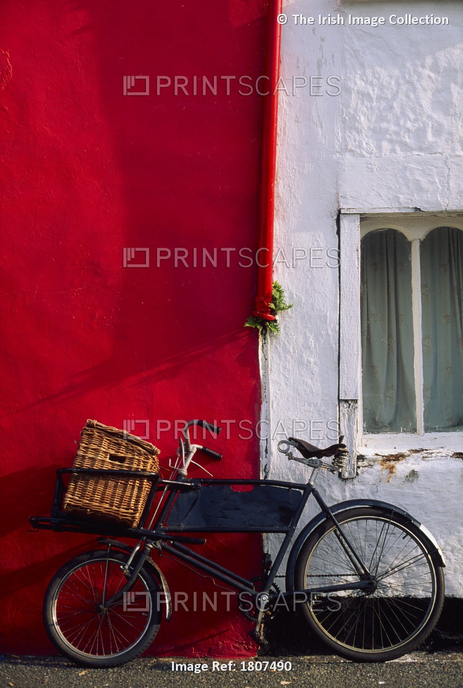 Kinsale, Co Cork, Ireland; Bicycle Parked In Front Of A Building