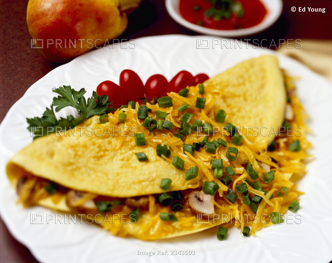 Food - Cheese and Mushroom Omelette garnished with chopped green onions ...