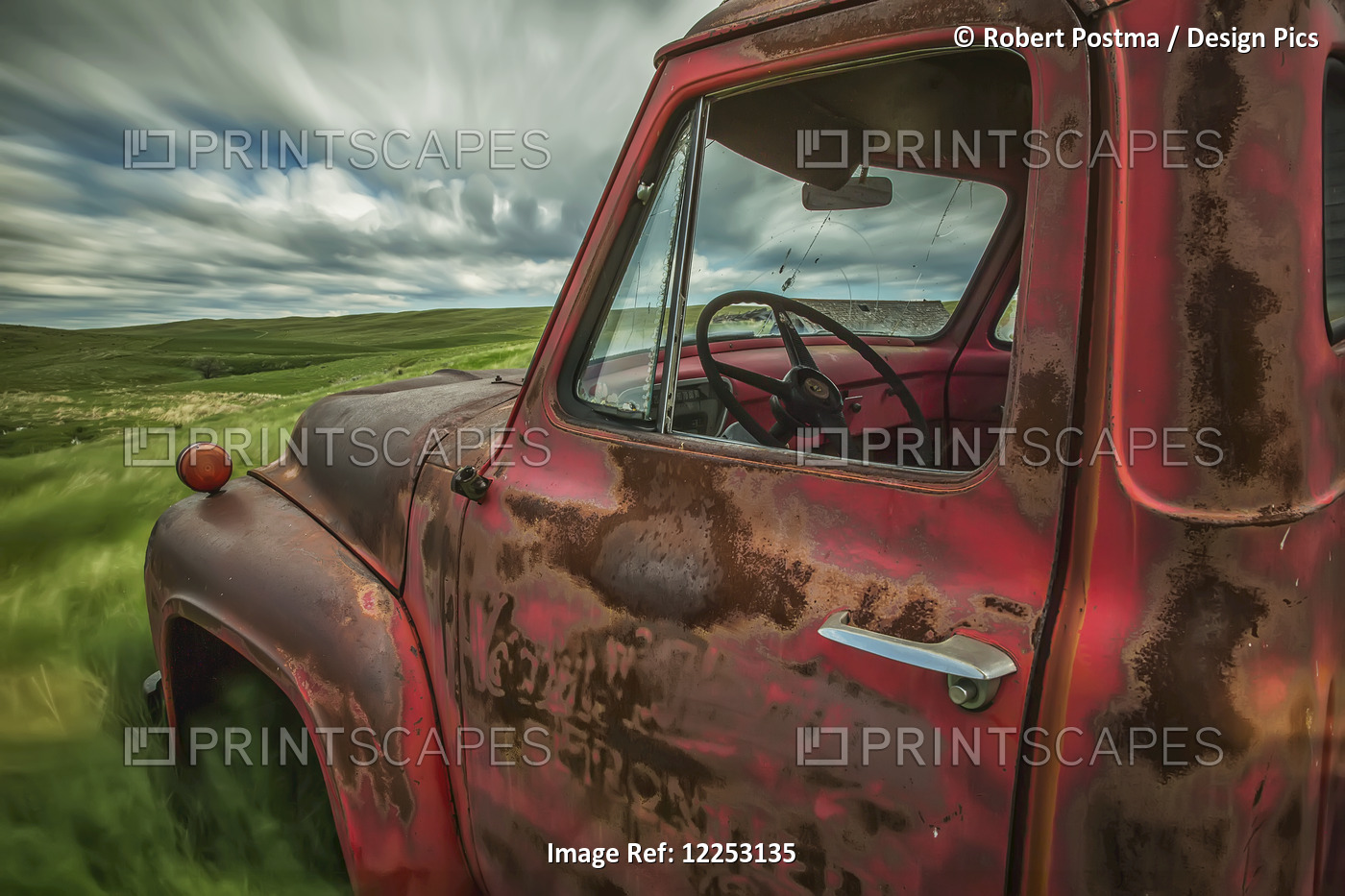 Long Exposure Of Clouds Drifting By Over An Abandoned Truck In A Rural Area; ...