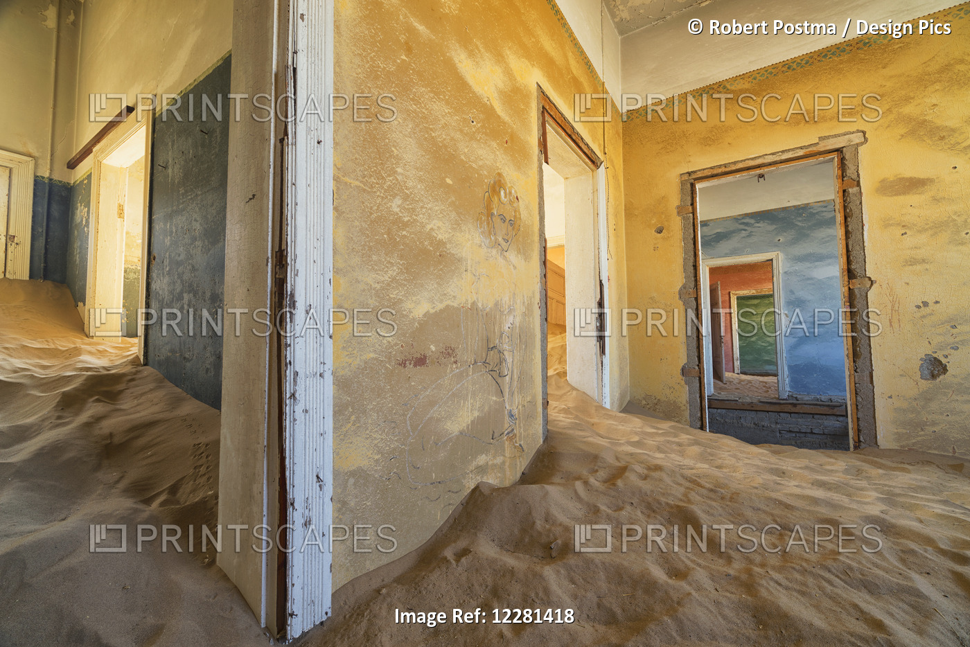 Drifting Sand Fills The Rooms Of A Colourful Abandoned House; Kolmanskop, ...