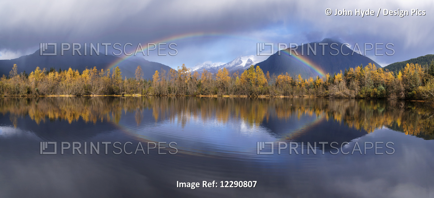 Scenic View Of Autumn Rain Showers And A Rainbow Reflected In Moose Lake, ...