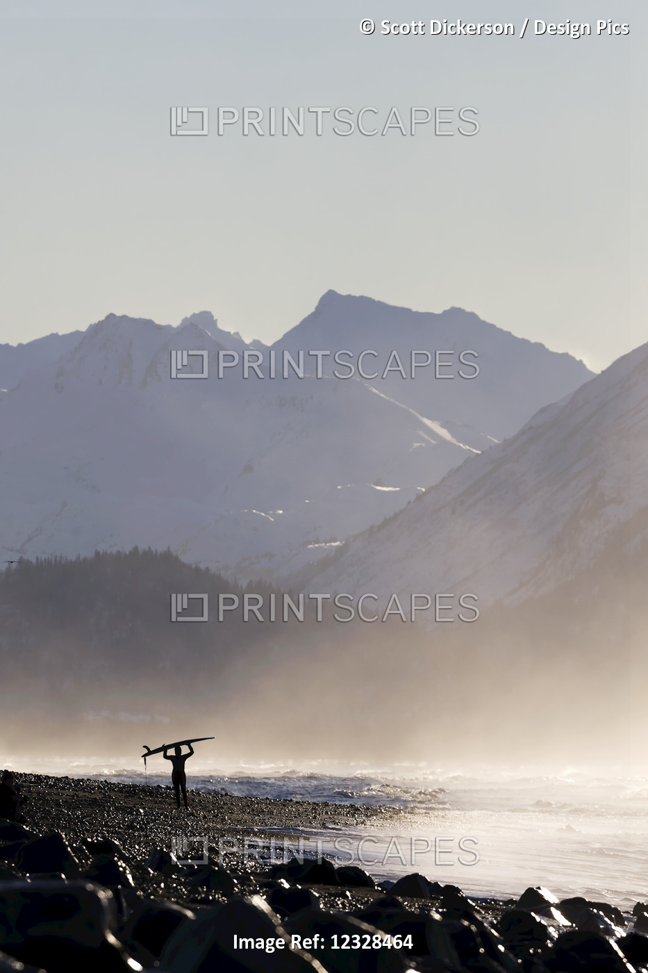A Surfer Carries Her Surfboard Across The Beach In The Mist Along The Coast; ...