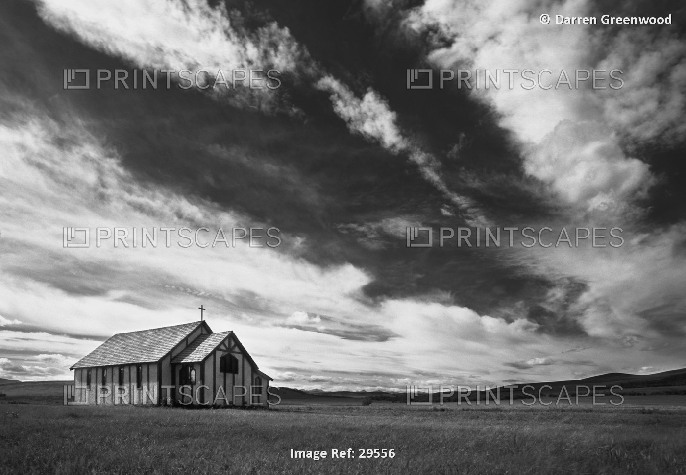 Small Country Church In Grass Field In Black And White