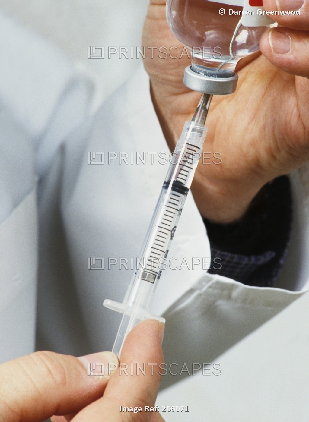 Medical Personnel Drawing Injection From Vial