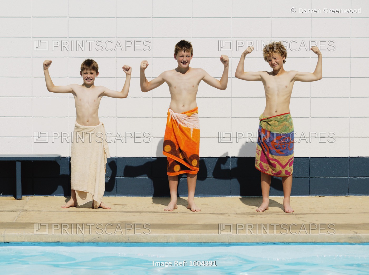 Three Boys Flex Muscles