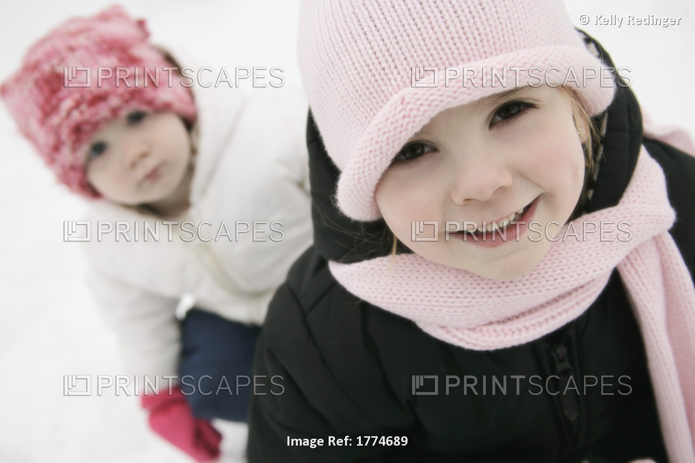 Two Girls In Winter Clothing