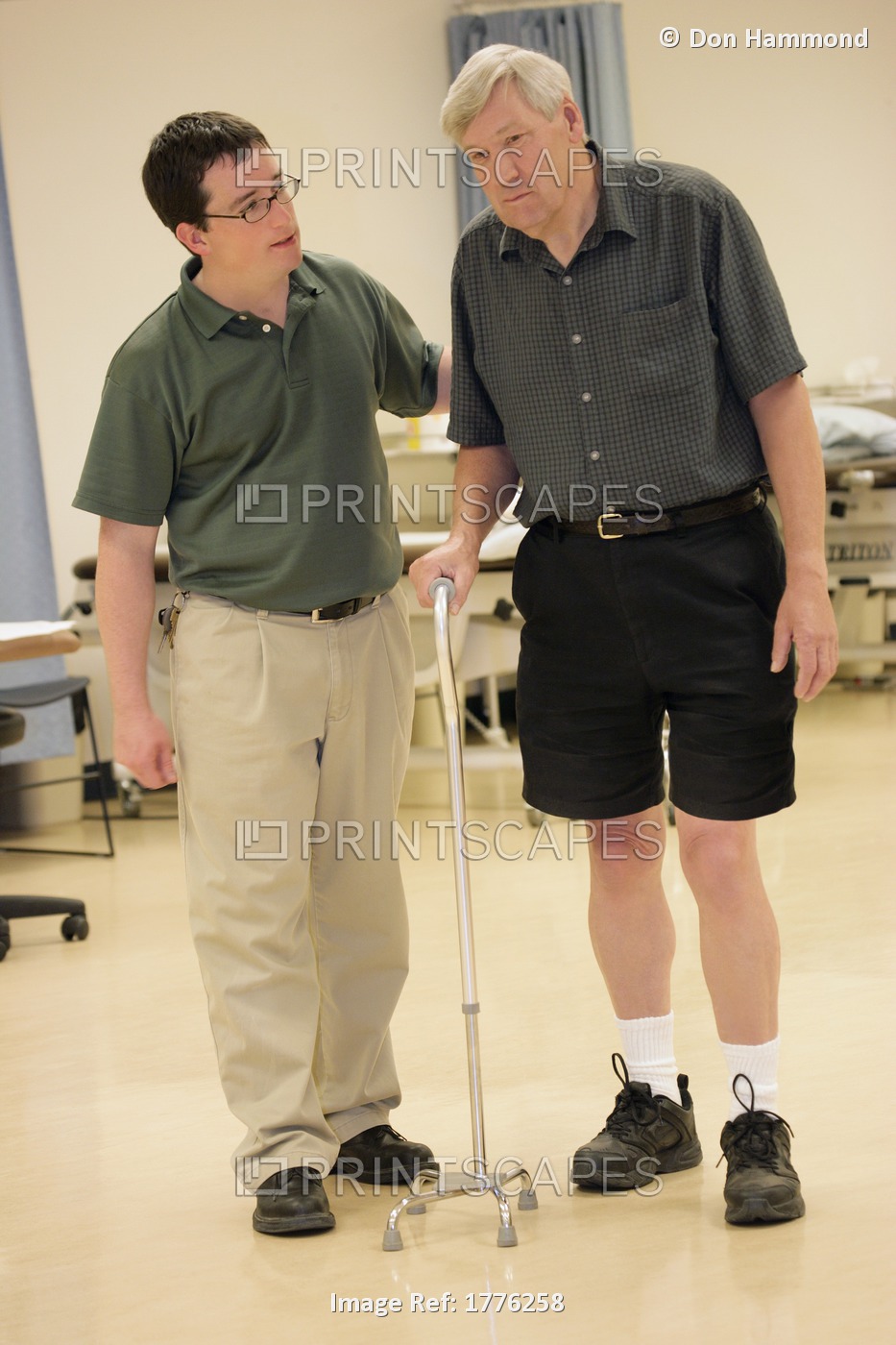 Occupational Therapist Helping A Patient To Walk