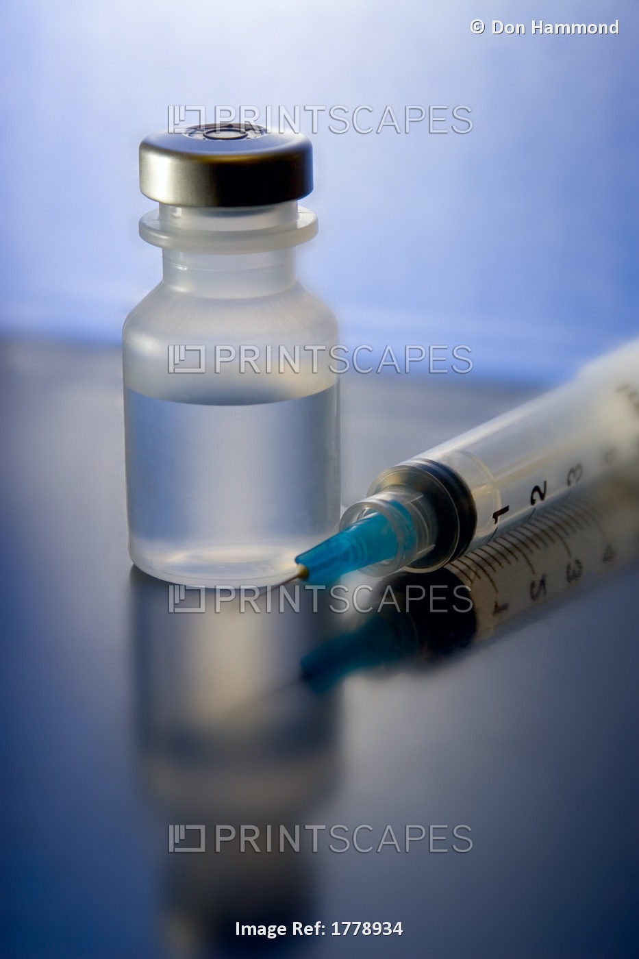 Closeup Of A Needle And Vial