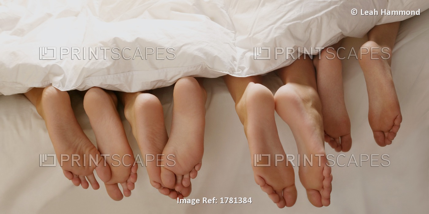 Feet In Bed