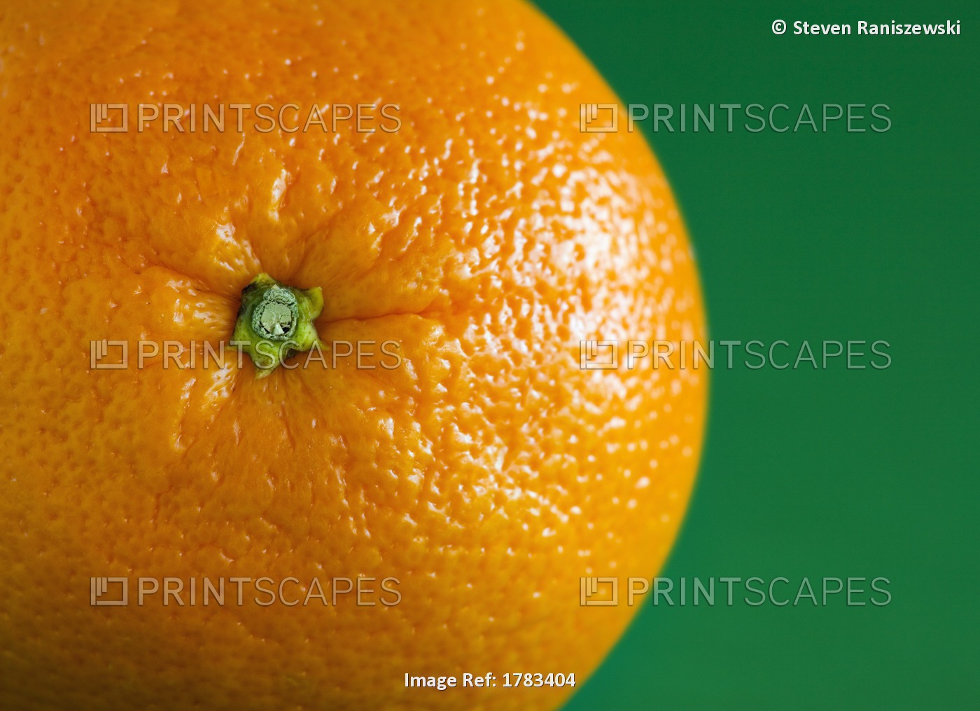 Orange Fruit On Green Background