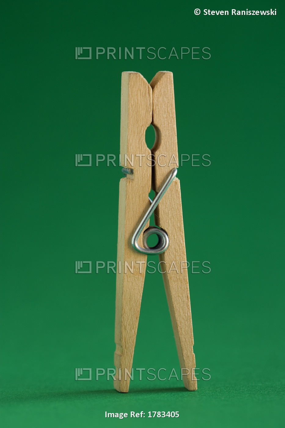 Clothespin On Green Background