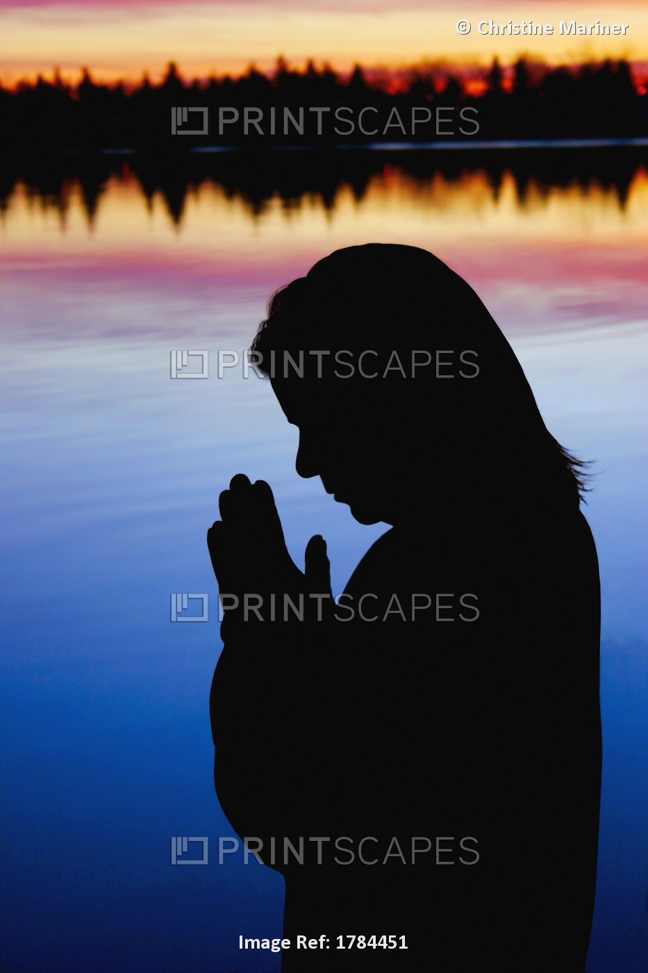Woman Praying Near Water