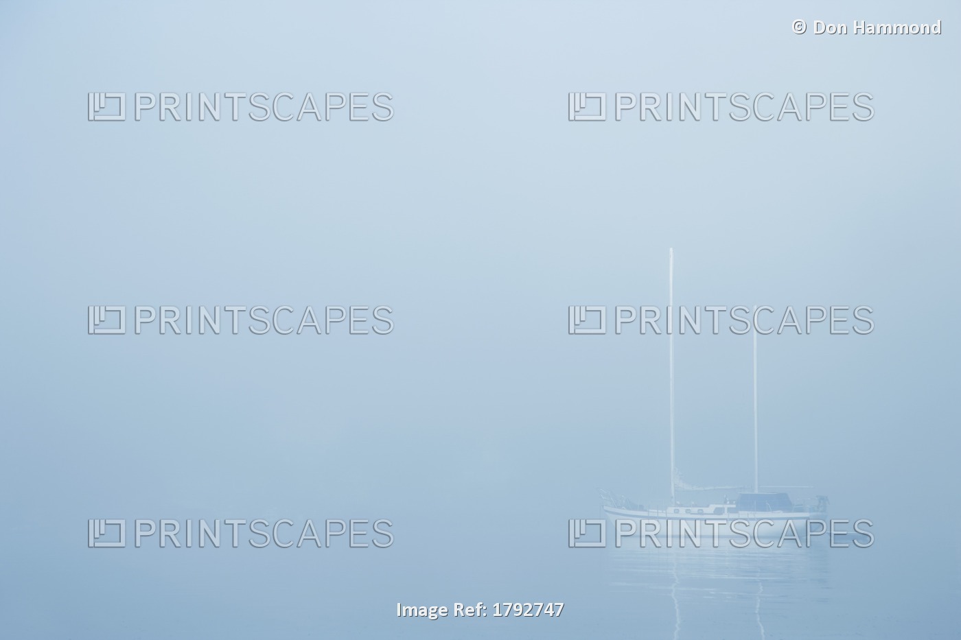 Sailboat In A Fog