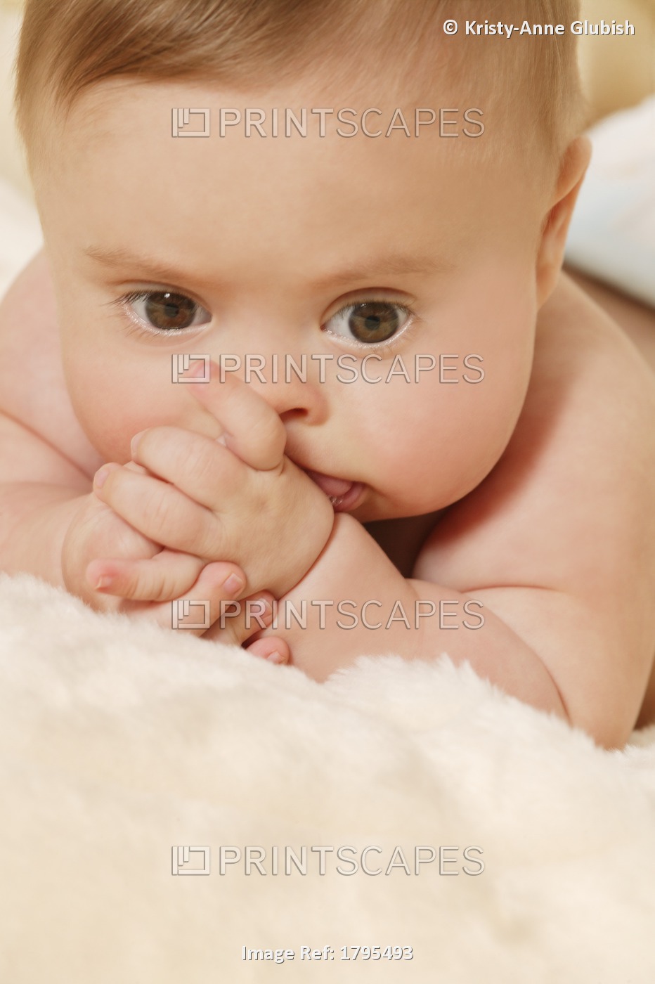 Baby with Down Syndrome Sucking Thumb