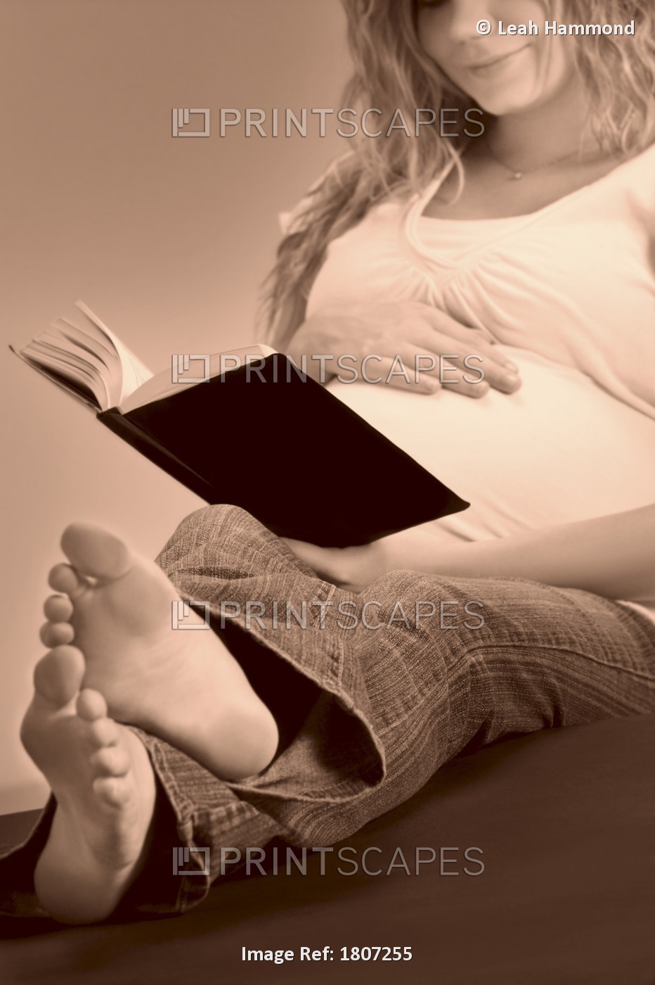 A Pregnant Woman Reading The Bible
