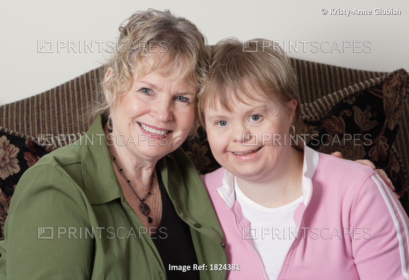 Portrait Of Mother And Daughter With Down Syndrome
