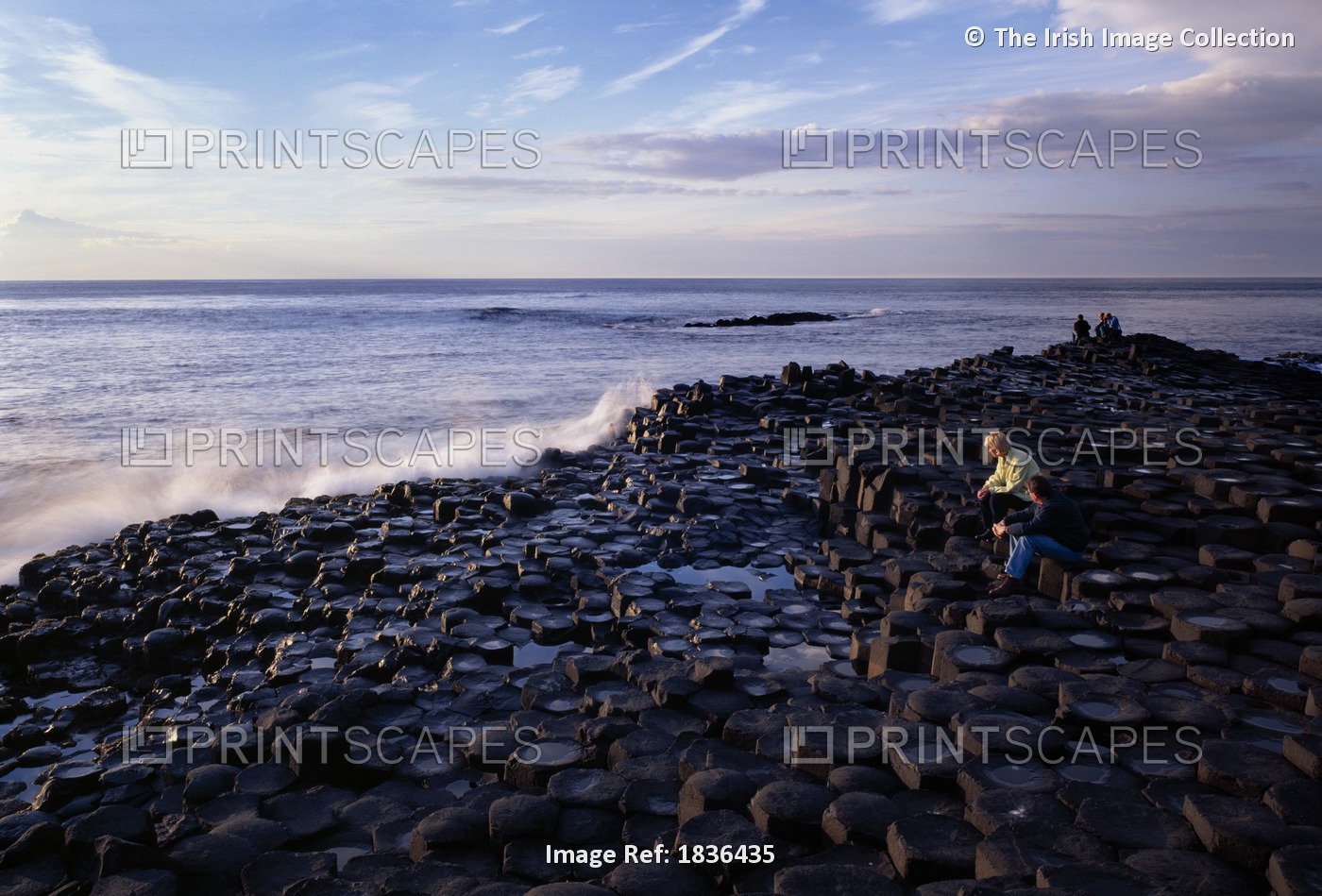 Co Antrim,Northern Ireland; Tourist Standing On The Giant's Causeway