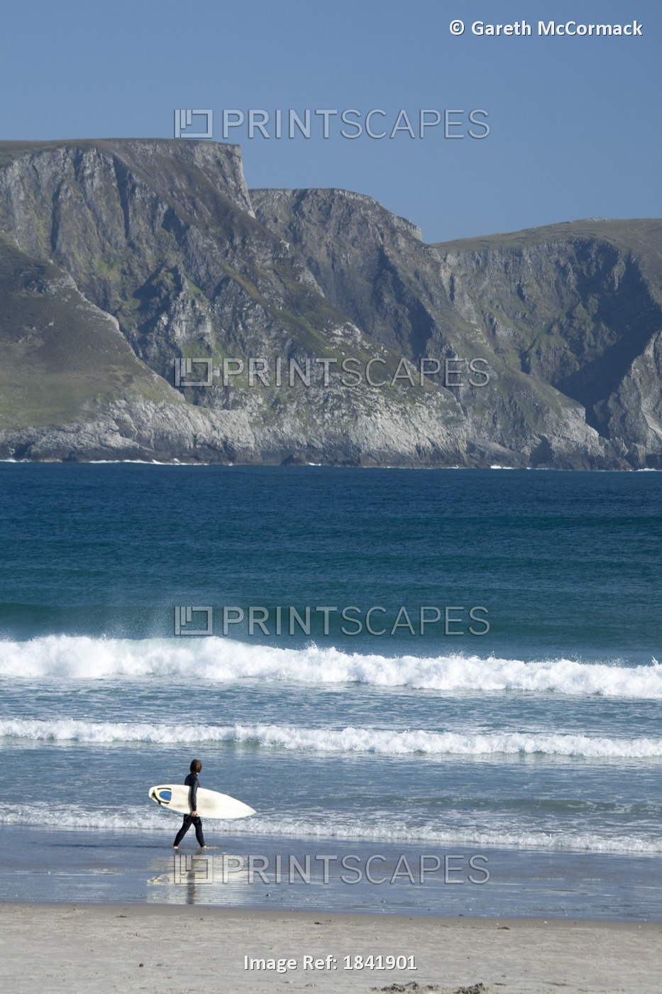 Achill Island, Co Mayo, Ireland; Surfer Walking Along Trawmore Beach