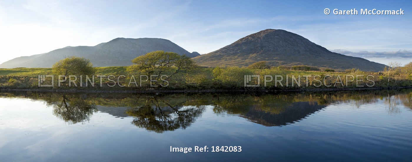 Maumturks, Co Galway, Ireland; Mountains Reflected In Water