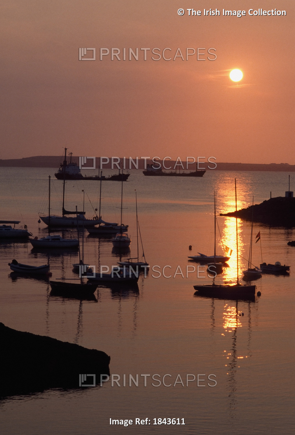 Dunmore East, Co Waterford, Ireland; Sailboats On The Harbour At Sunset