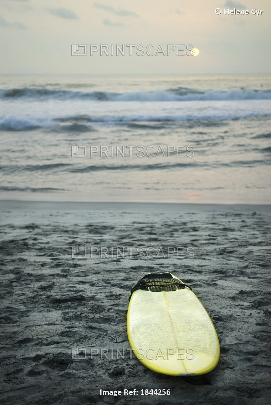 Mexico; Surfboard Lying On Sand