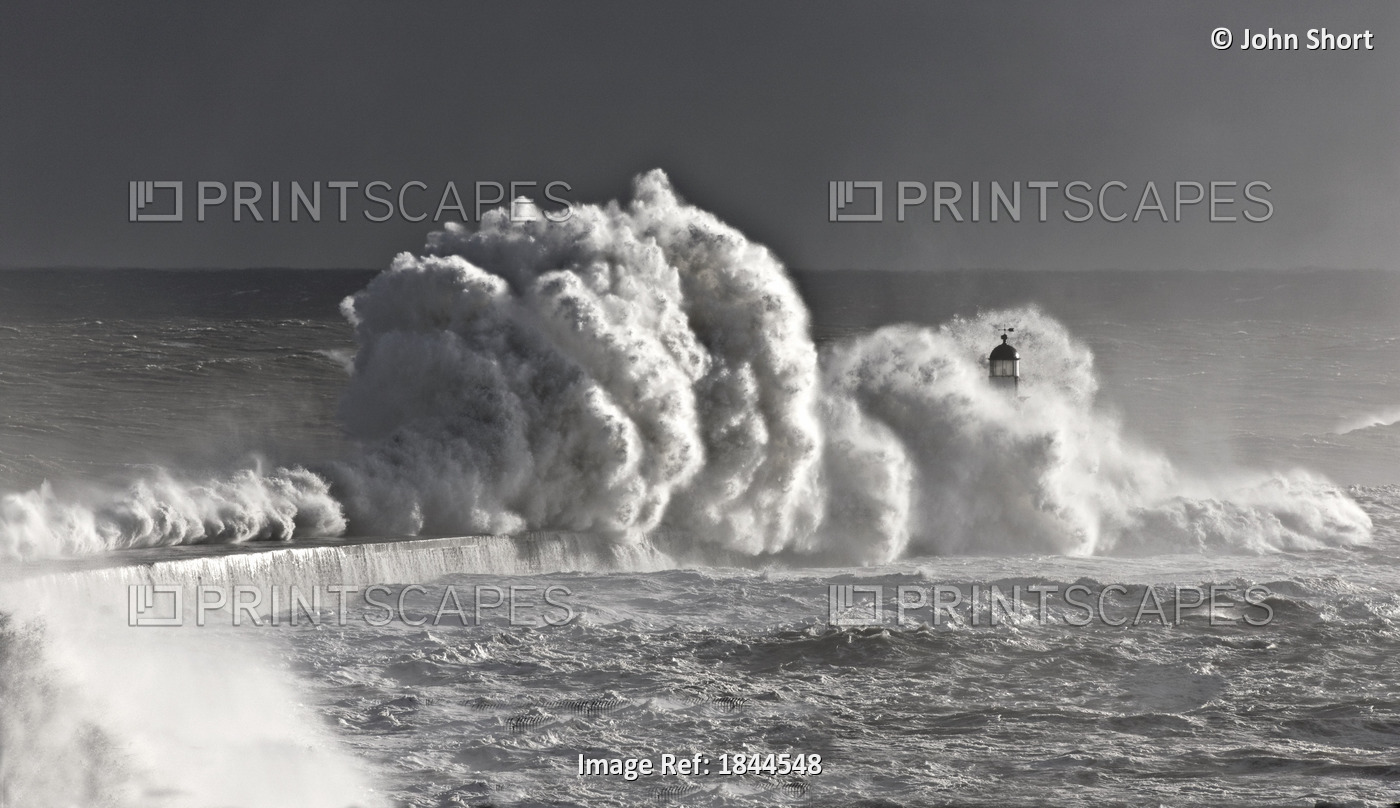 Seaham, England; Stormy Waves Pounding Seawall