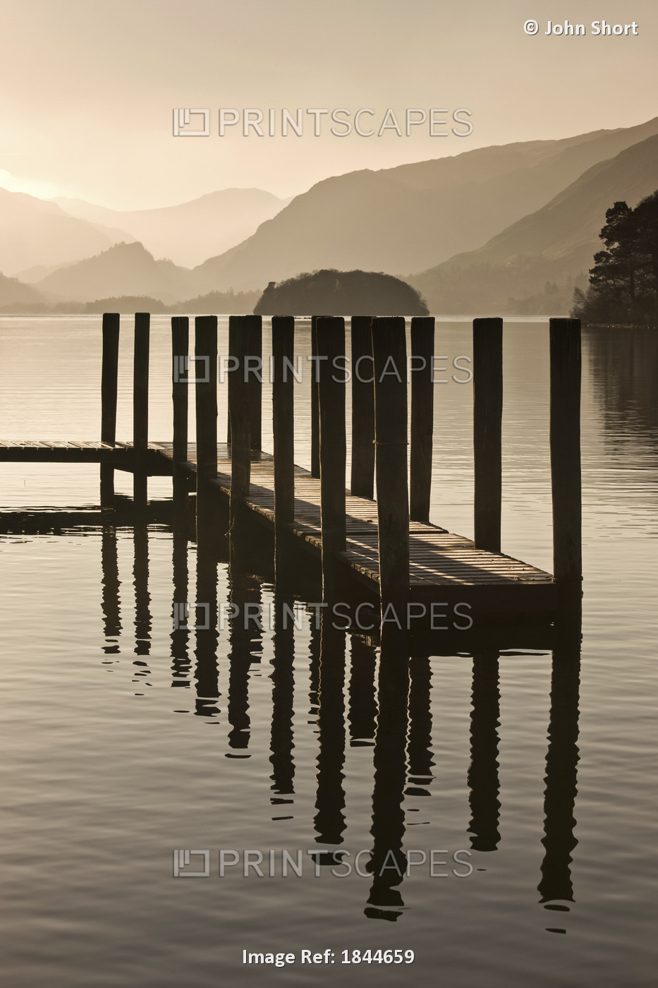 Wooden Dock In The Lake At Sunset, Cumbria, England