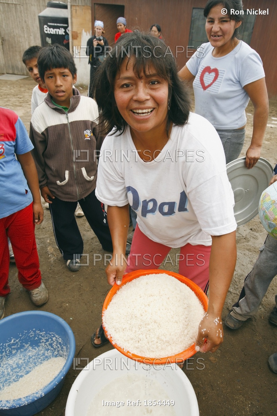 Woman With Pan Of Rice, Lima, Peru