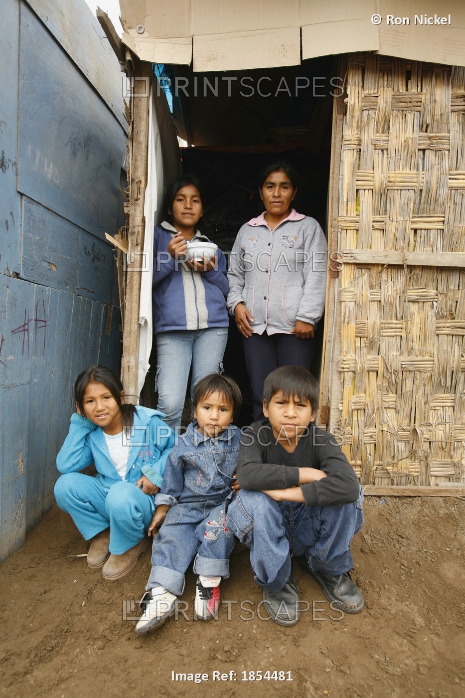 Family At Entrance To Home, Lima, Peru