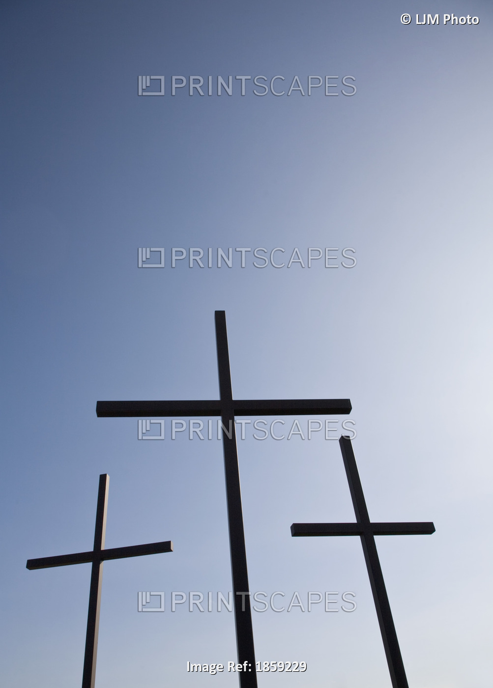 Three Crosses Against Blue Sky