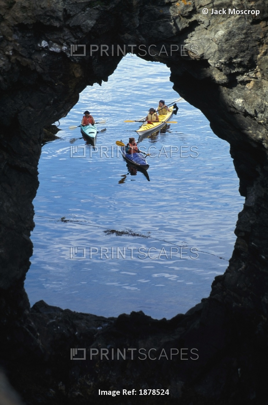 People Sea Kayaking At Hole In The Wall