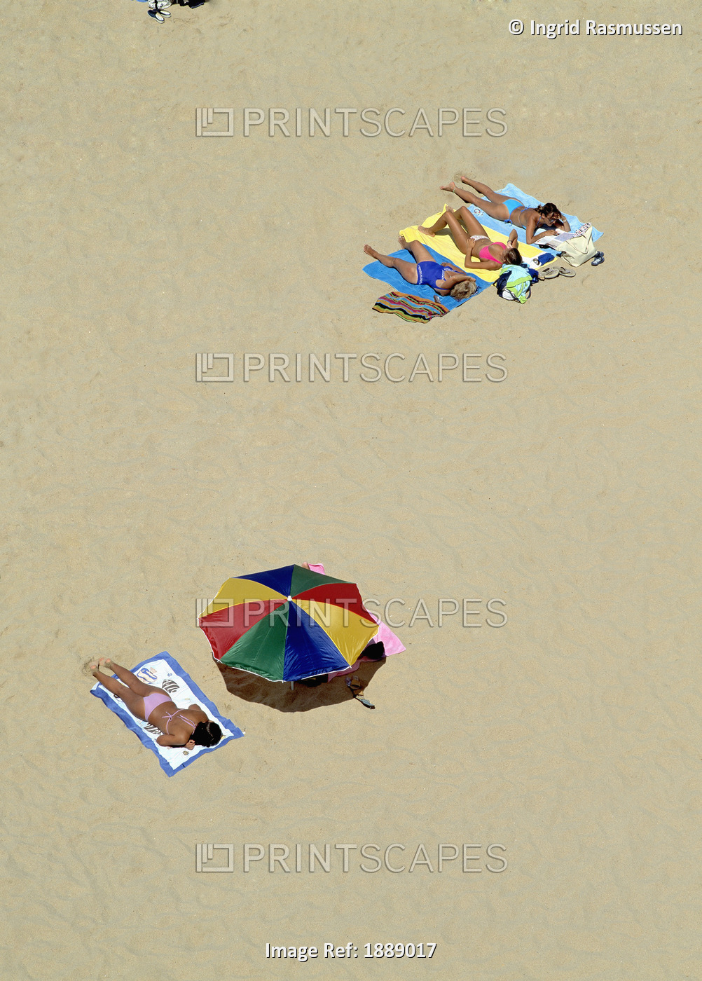 Women Sunbathing On Beach, Aerial View