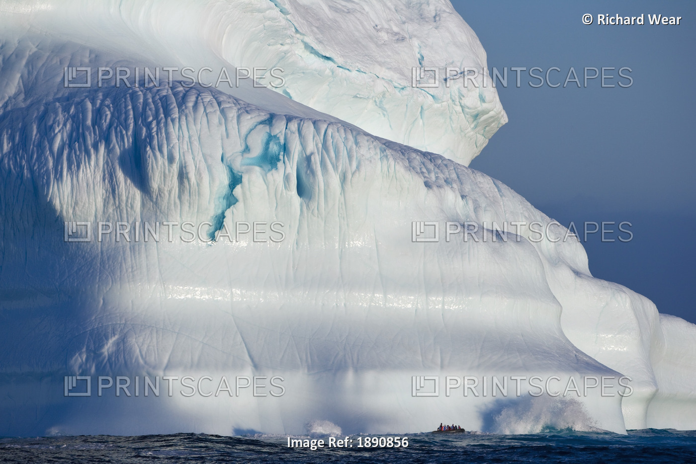 A Composite Image Of Tourists Exploring An Iceberg On Their Journey Throughout ...