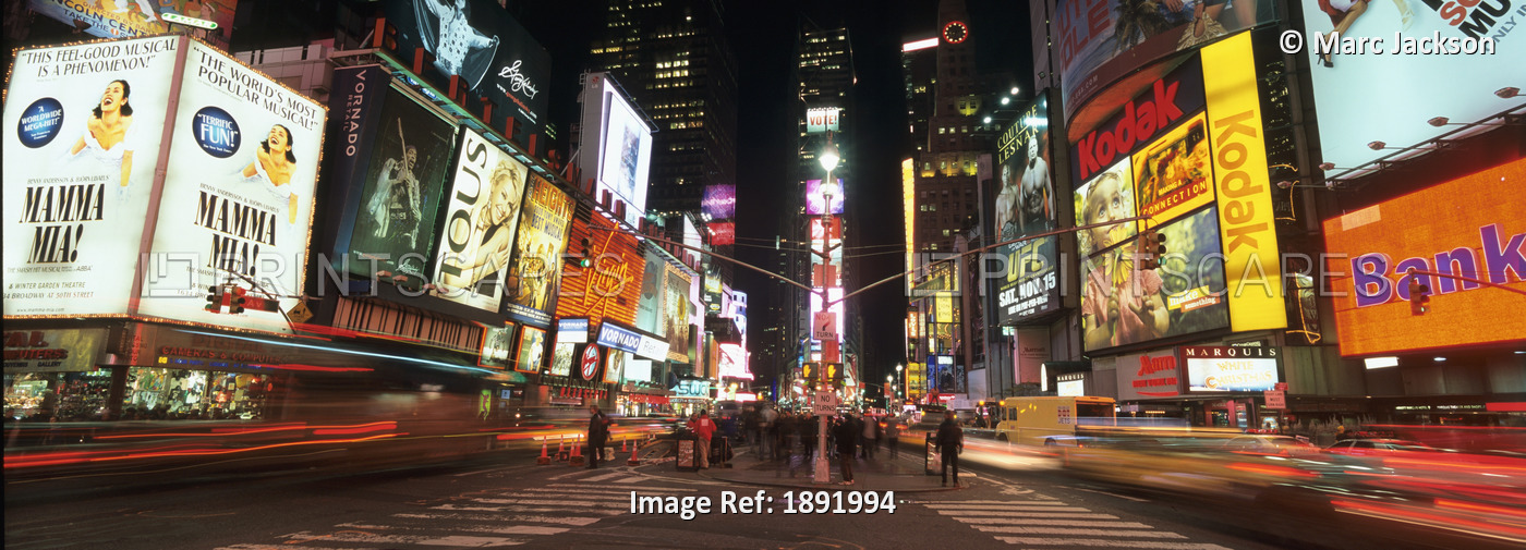 Times Square In Midtown Manhattan Illuminated At Night