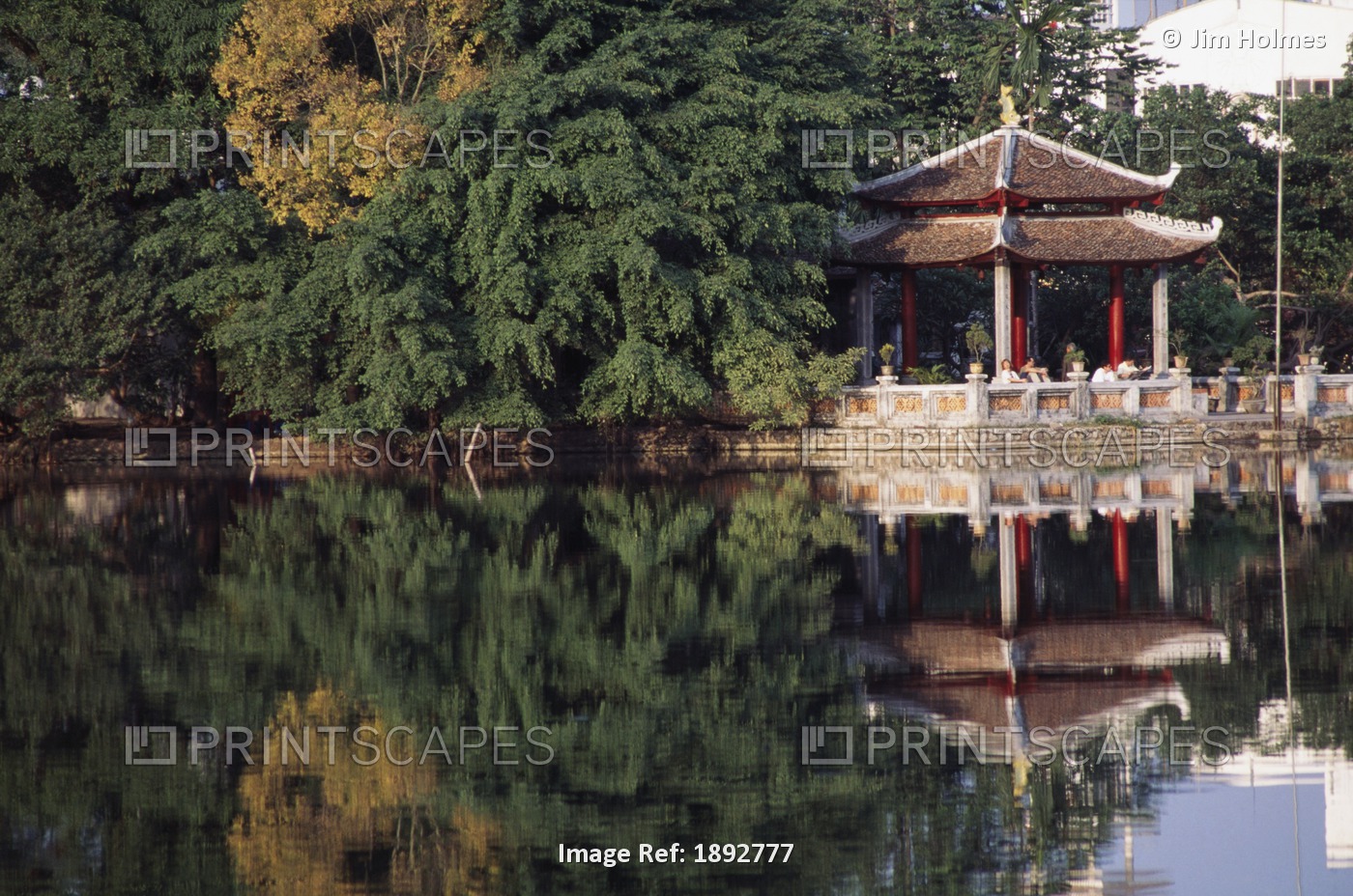 People Resting Under Pagoda On Hoan Kiem Lake Shore