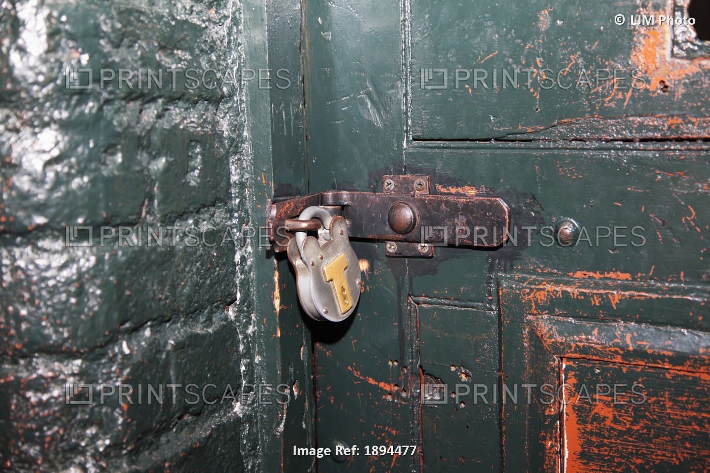 An Old Door And Padlock In Kilmainham Jail; Dublin, Dublin County, Ireland