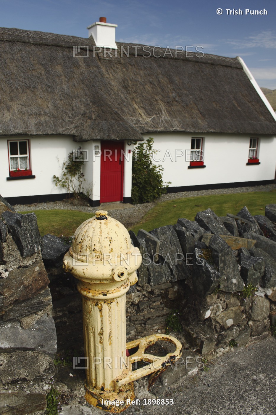 Thatched Cottage And A Fire Hydrant In Tully Cross In Connacht Region; Tully ...