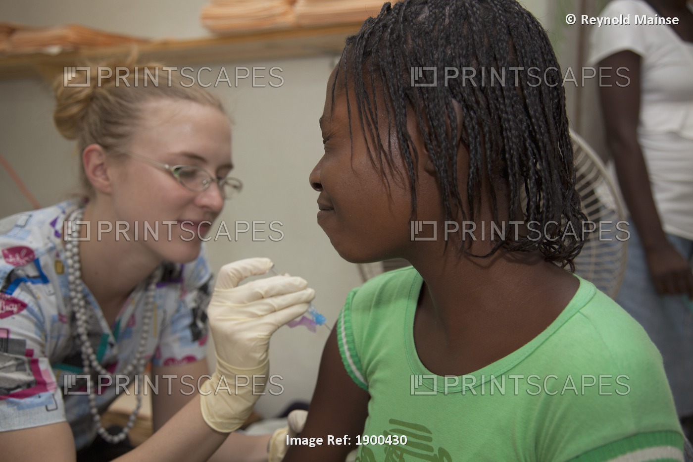 A Nurse Gives A Vaccination At A Clinic; Grand Saline, Haiti