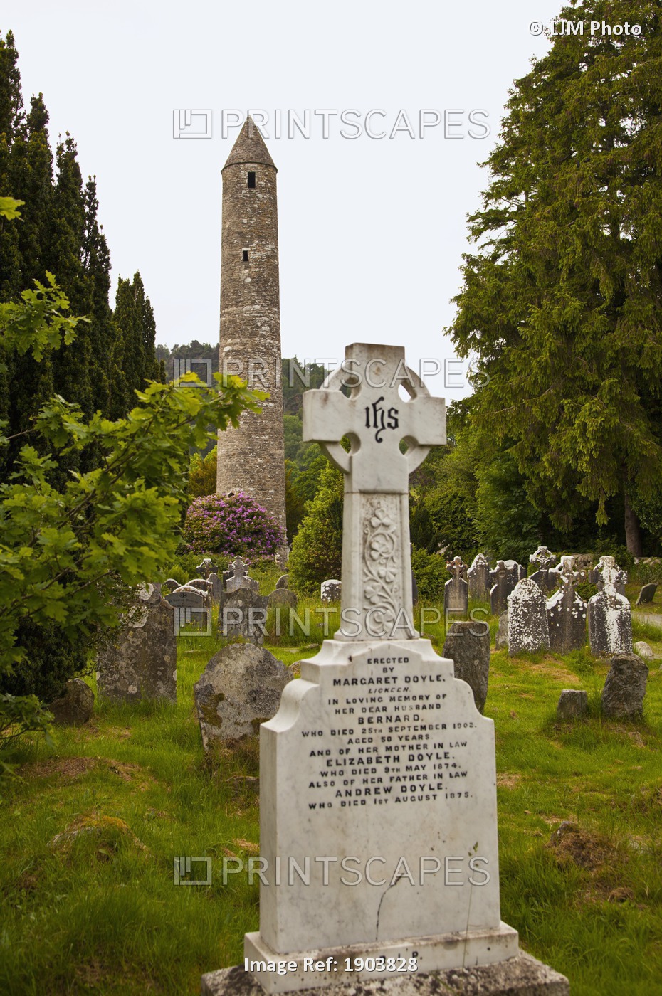 Tombstones In A Cemetery And A Round Tower On A 6Th Century Monastic Site; ...