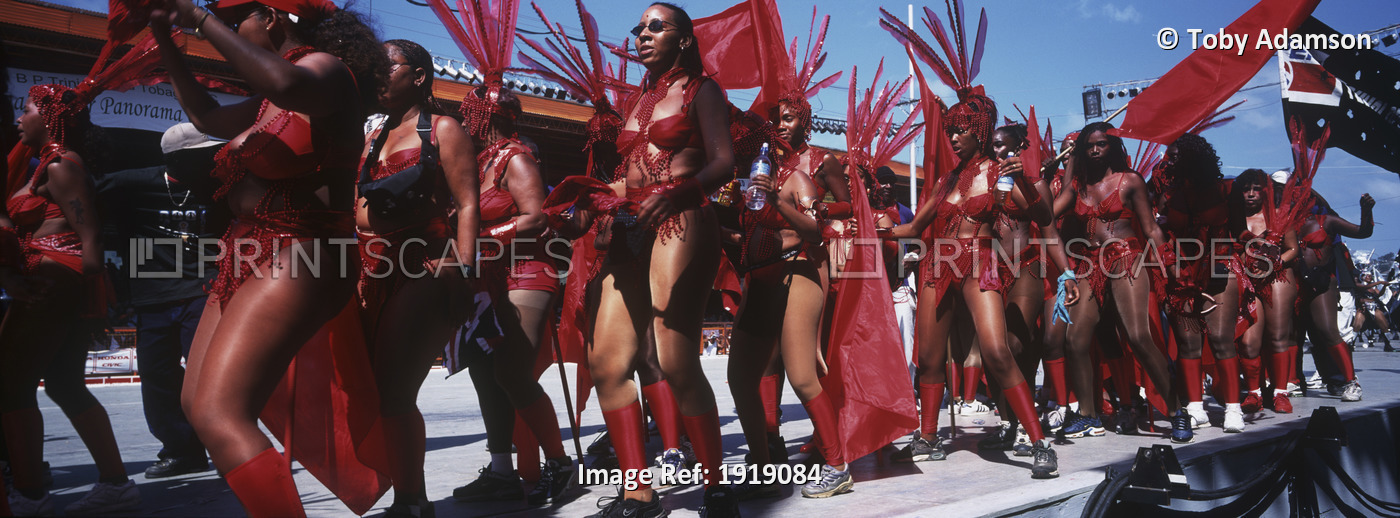 People Wearing Red Costumes During Carnival