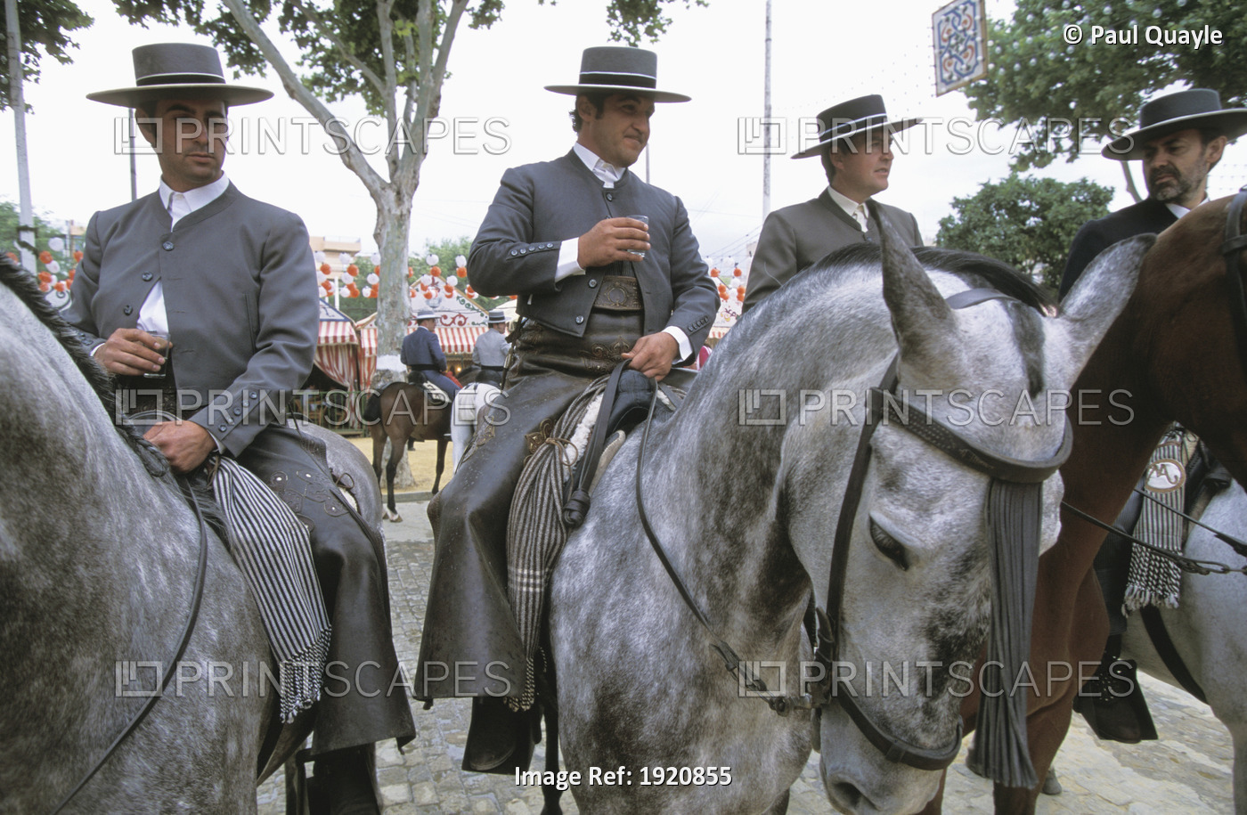 Four Men On Horses At Week Long Festival, Feria