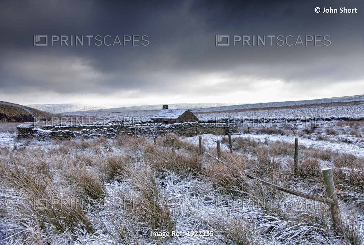 Cloudy Sky Over Snowy Field; Yorkshire Dales, England