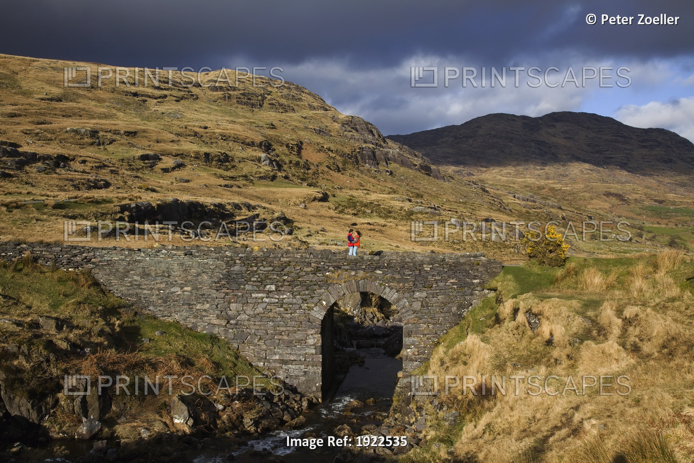 A Person Standing On A Bridge; Healy Pass, County Cork, Ireland