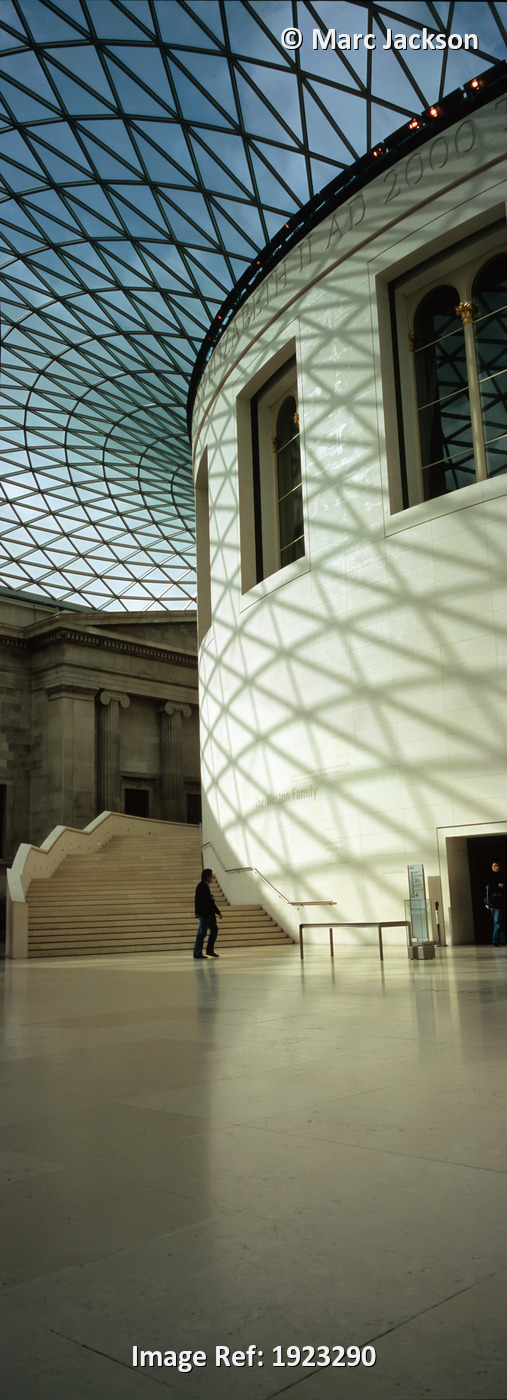 Silhouette Of Man Passing Reading Room In Great Court Of British Museum, ...