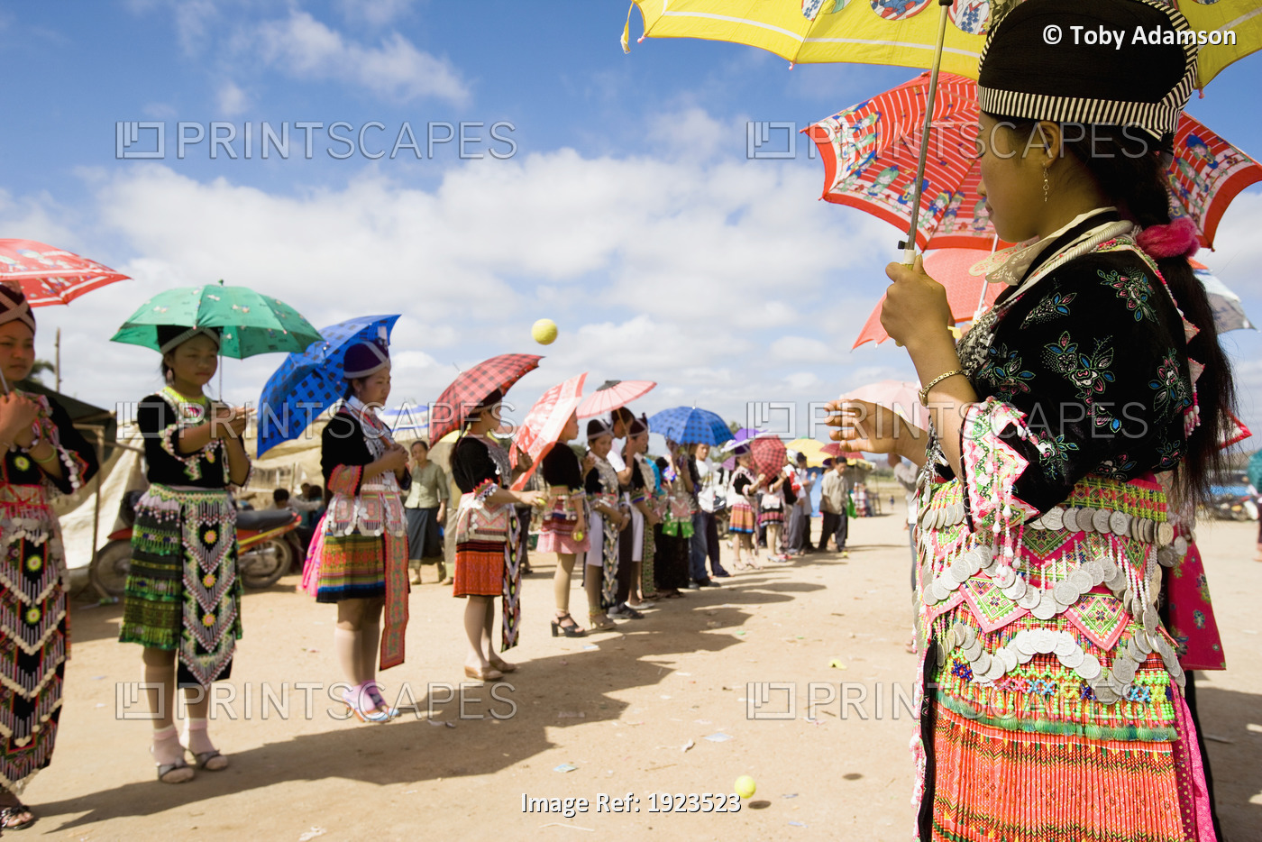 Hmong Girls In Traditional Costume Throwing Tennis Balls At A Courting Ceremony ...