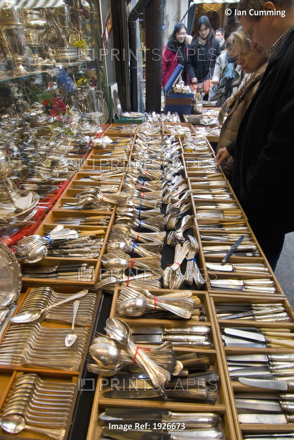 People Looking Through Cutlery For Sale In The Porte De Clignancourt Antiques ...