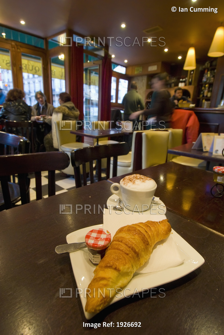 Croissant And Coffee Laid Out For Breakfast In A Cafe, Paris, France