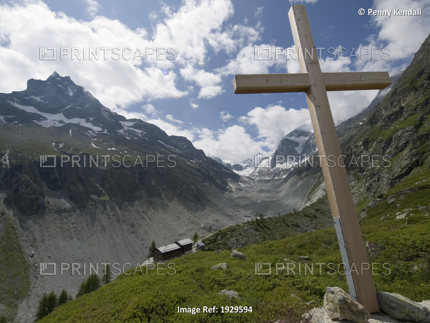 Summer in the mountains. The cross above the Cabin de Petit Mountet refuge. ...
