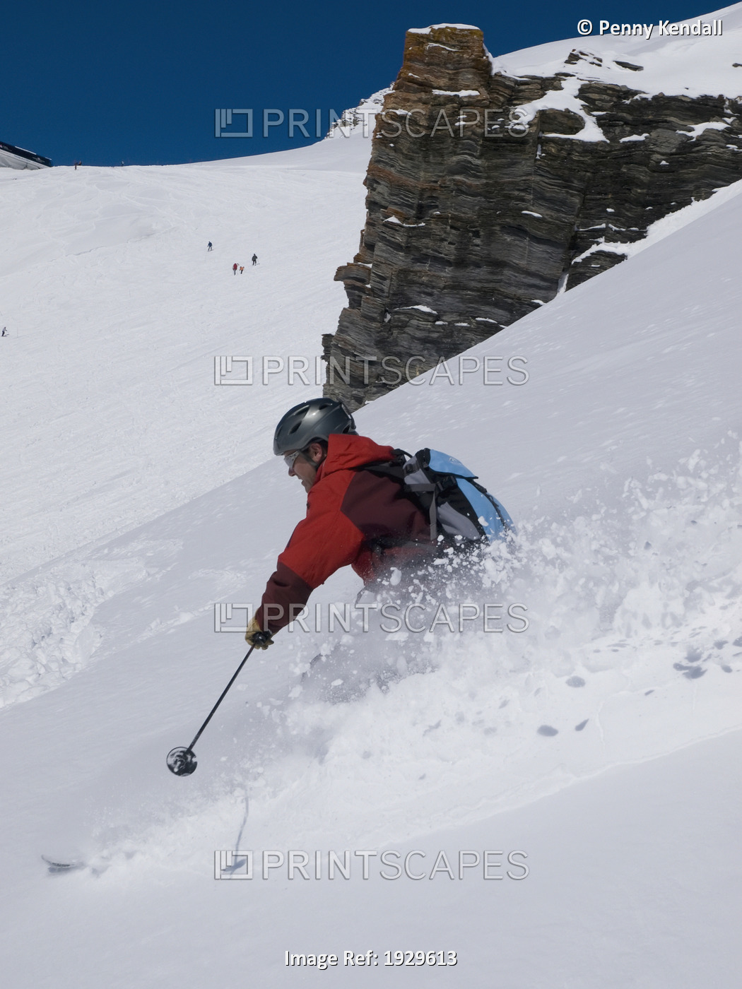 Solatary skier, off piste in fresh powder snow. Crans Montana, Valais. ...