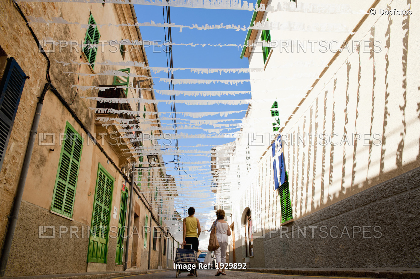 Women Going Shopping On A Decorated Street In Alcudia, Mallorca, Balearic ...